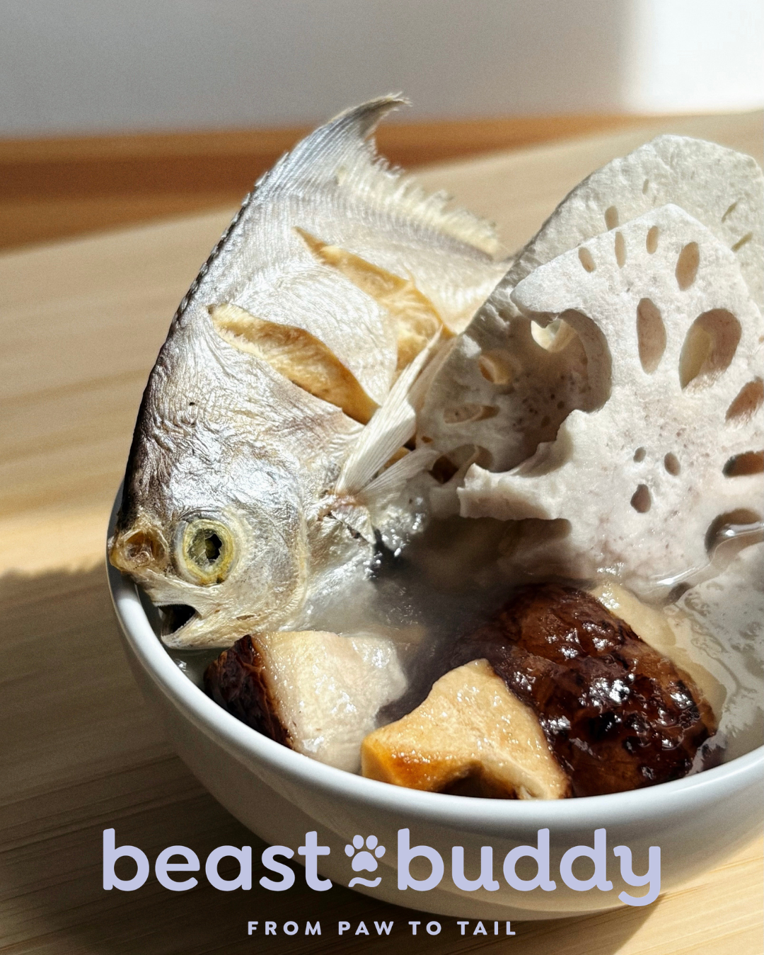 Dried fish and lotus root in a bowl with 'beast buddy' branding.